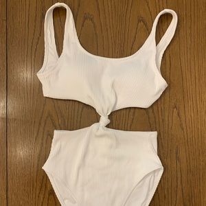 White (never before worn) one piece swim suit